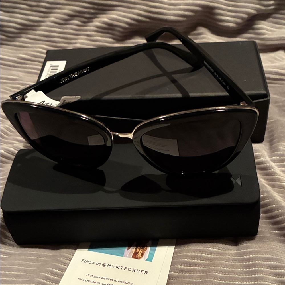 Perfect stocking stuffers. 
Next day shipping 
MVMT Black sunglasses with Box